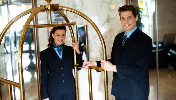 Hotel Summer Bell Staff Smiling for Camera