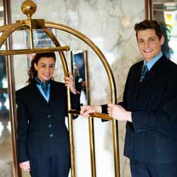 Summer Hotel Bellhops Pose for Photo