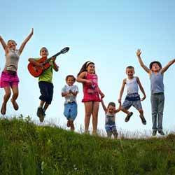 Summer Camp Kids Jumping for Photo